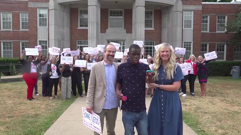 A teenager was adopted after spending 15 years in foster care.