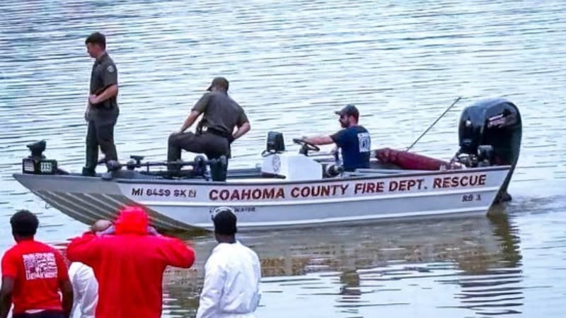 Coahoma County Fire Department and other agencies investigate after a body was recover from...